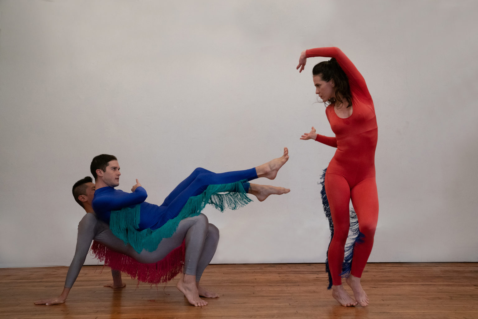 Dancers Champi, Tuason, Kresge performing Combustion